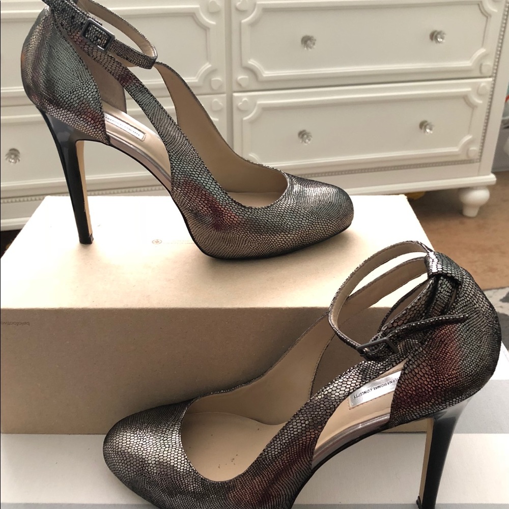 stilettos, slightly used, no tears on shoes